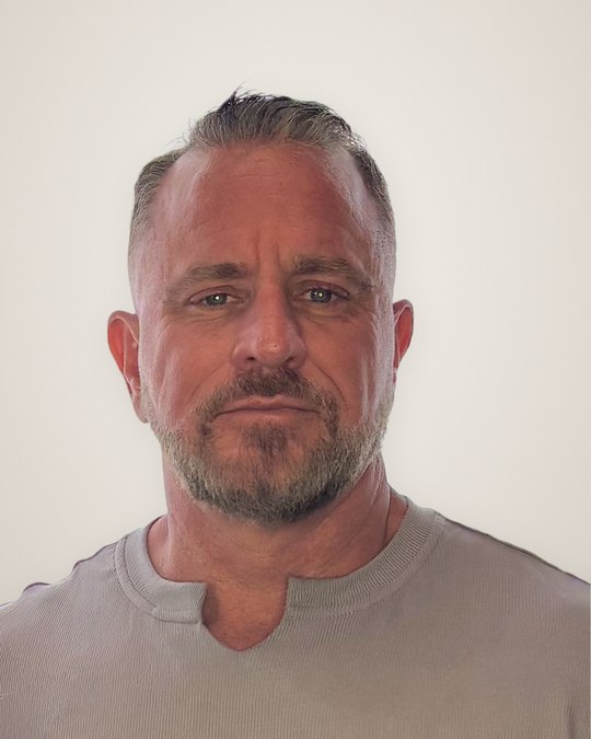 Portrait of John Thompson, Co-Founder & Partner at Melius Wellness